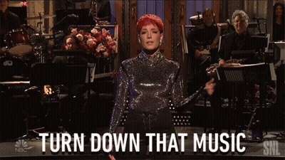 Woman Singing On Stage Saying Turn Down That Music