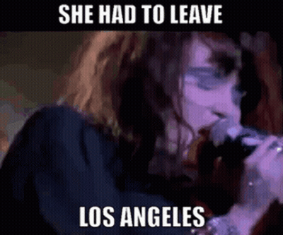 Woman Singing She Had To Leave Los Angeles GIF