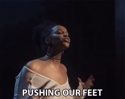 Woman Singing Song Push Our Feet GIF