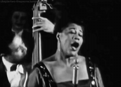 Woman Singing With Bass Player GIF