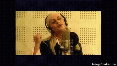 Woman Singing With Headphones And Microphone GIF