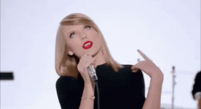 Woman Sings Into Microphone With Band Saying Hate GIF