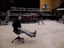 Woman Sit In Sliding Chair GIF