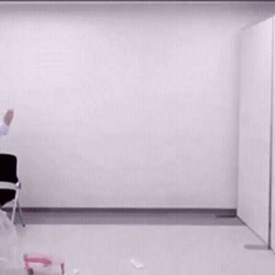 Woman Sits At Table Saying In Defense GIF