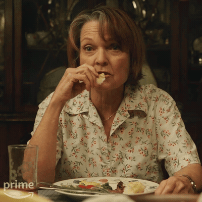 Woman Sits At Table With Plate Of Food And Prime Water Glass GIF