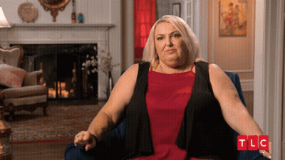 Woman Sits In Chair With TLC GIF