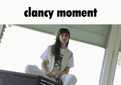 Woman Sits On Box With Clancy Moment GIF