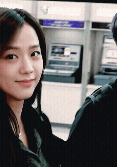 Woman Sitting At ATM With 'A' Sticker GIF