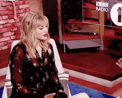Woman Sitting At BBC Radio Screen GIF