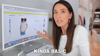 Woman Sitting At Computer With Basic Face GIF