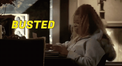 Woman Sitting At Desk With Busted Behind GIF