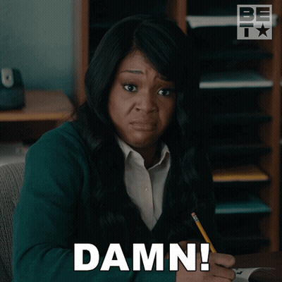 Woman Sitting At Desk With Damn GIF