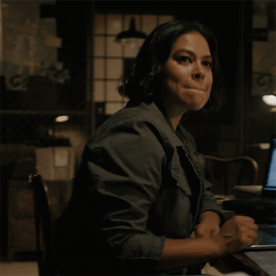 Woman Sitting At Desk With Laptop Saying Copy GIF