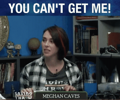 Woman Sitting At Desk With Meghan Caves Sign GIF