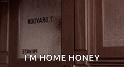 Woman Sitting At Door Saying I'm Home Honey GIF