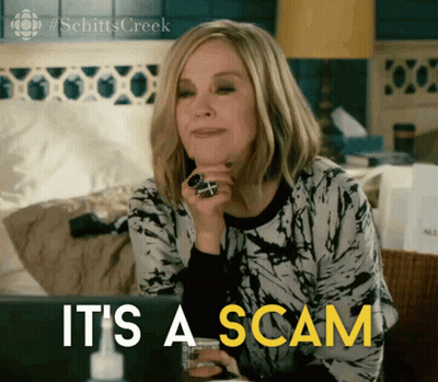 Woman Sitting At Laptop Saying It's A Scam GIF