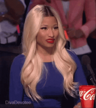 Woman Sitting At Microphone Holding Coca Cola Can GIF