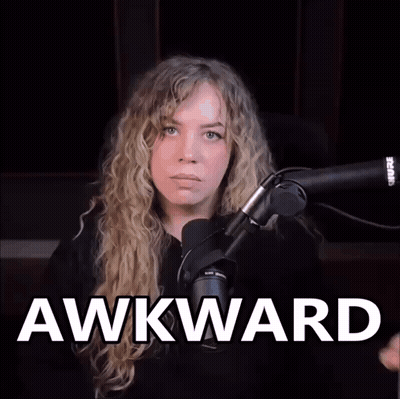Woman Sitting At Microphone Saying Awkward GIF