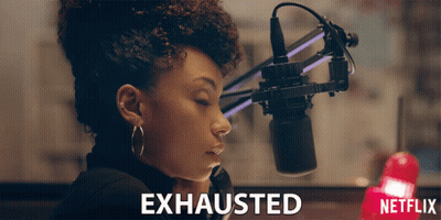 Woman Sitting At Microphone Saying Exhausted GIF