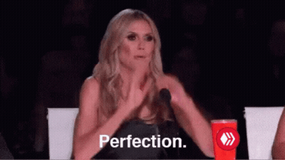 Woman Sitting At Microphone Saying Perfection GIF