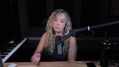 Woman Sitting At Microphone Saying Swoon GIF