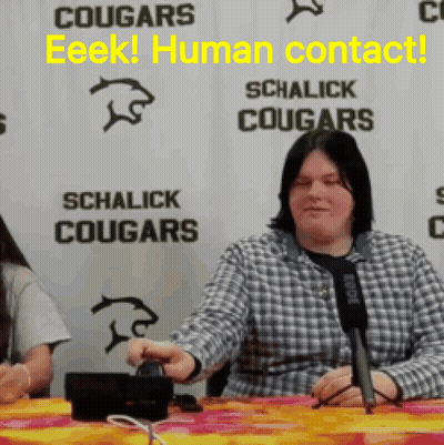Woman Sitting At Microphone Sign Schalick Cougars GIF