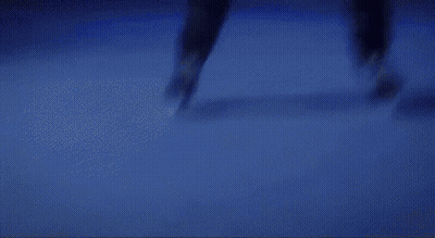 Woman Sitting At Restaurant Table GIF