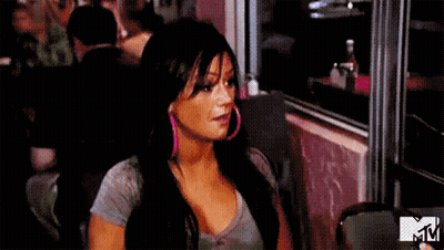 Woman Sitting At Restaurant Table With Open Mouth GIF