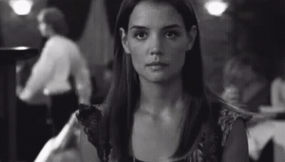 Woman Sitting At Restaurant Table GIF