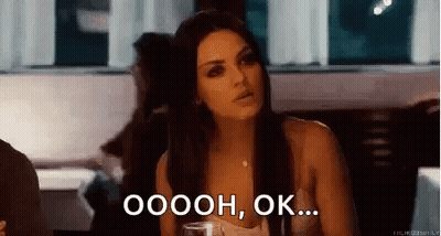 Woman Sitting At Restaurant With Wine Saying Oooh Ok GIF