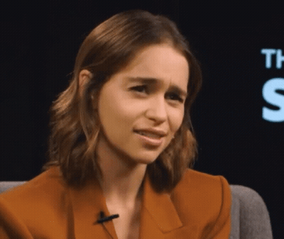 Woman Sitting At Sign The S GIF