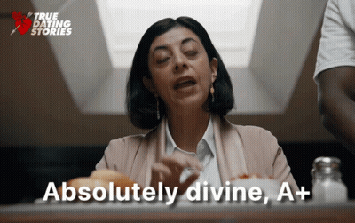 Woman Sitting At Table Absolutely Divine A+ GIF