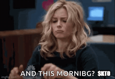 Woman Sitting At Table Asking And This Morning GIF