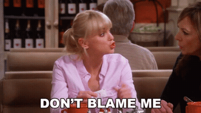 Woman Sitting At Table Saying Don't Blame Me GIF