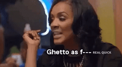 Woman Sitting at Table Saying Ghetto As F