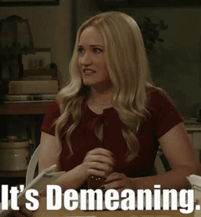 Woman Sitting At Table Saying It's Demeaning GIF
