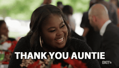 Woman Sitting At Table Saying Thank You Auntie GIF