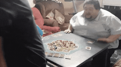 Woman Sitting At Table Saying Wait What GIF