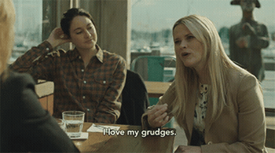 Woman Sitting At Table Says I Love My Grudge GIF