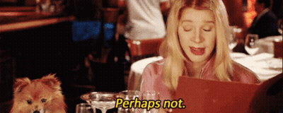 Woman Sitting At Table With Dog And Menu Saying Perhaps Not GIF