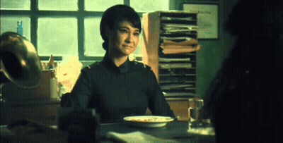 Woman Sitting At Table With Food GIF