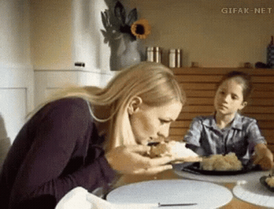 Woman Sitting At Table With Food GIF