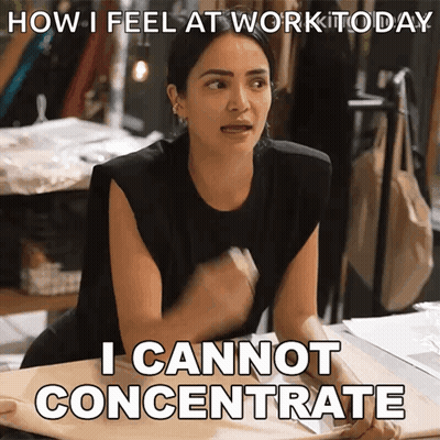 Woman Sitting At Table With I Cannot Concentrate GIF
