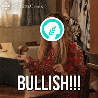 Woman Sitting At Table With Laptop And Brain Graphic On Face GIF