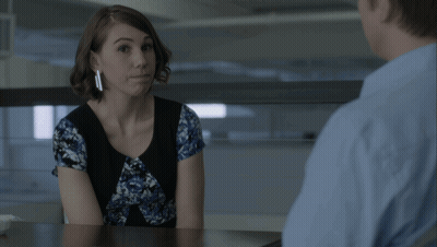 Woman Sitting At Table With Man In Blue Shirt GIF