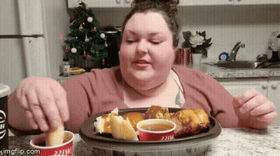 Woman Sitting At Table With McDonald's Cup And Food GIF