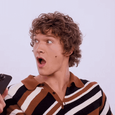 Woman Sitting At Table With Mouth Open GIF