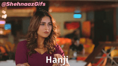Woman Sitting At Table With Name Hanji GIF