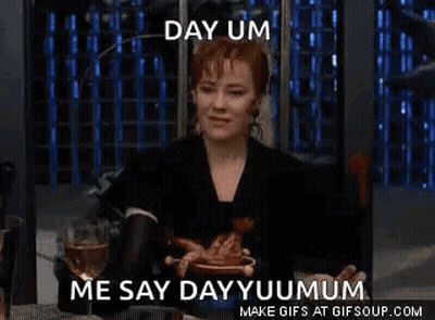 Woman Sitting At Table With Plate Of Food And Wine GIF