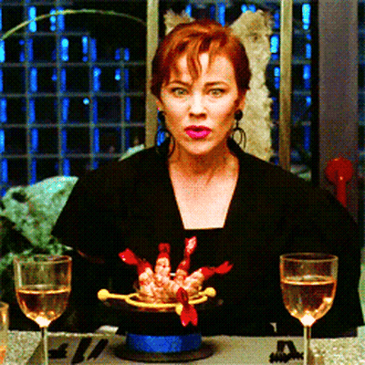 Woman Sitting At Table With Two Wine Glasses GIF